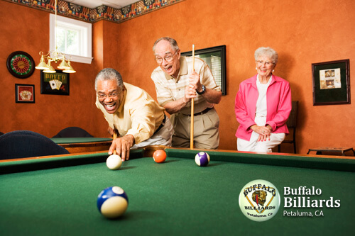 3 people playing cutthroat pool